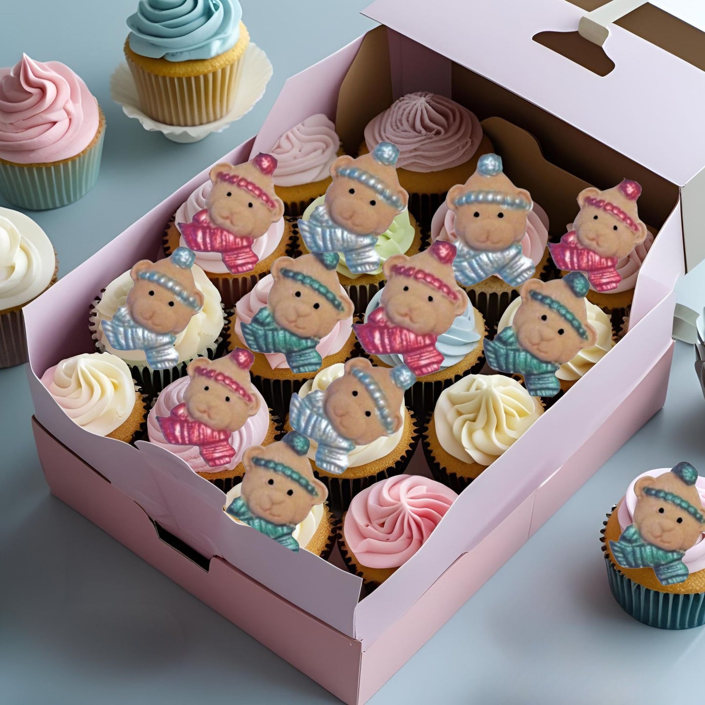 Decorative cupcakes with edible Christmas bear faces decorations on top