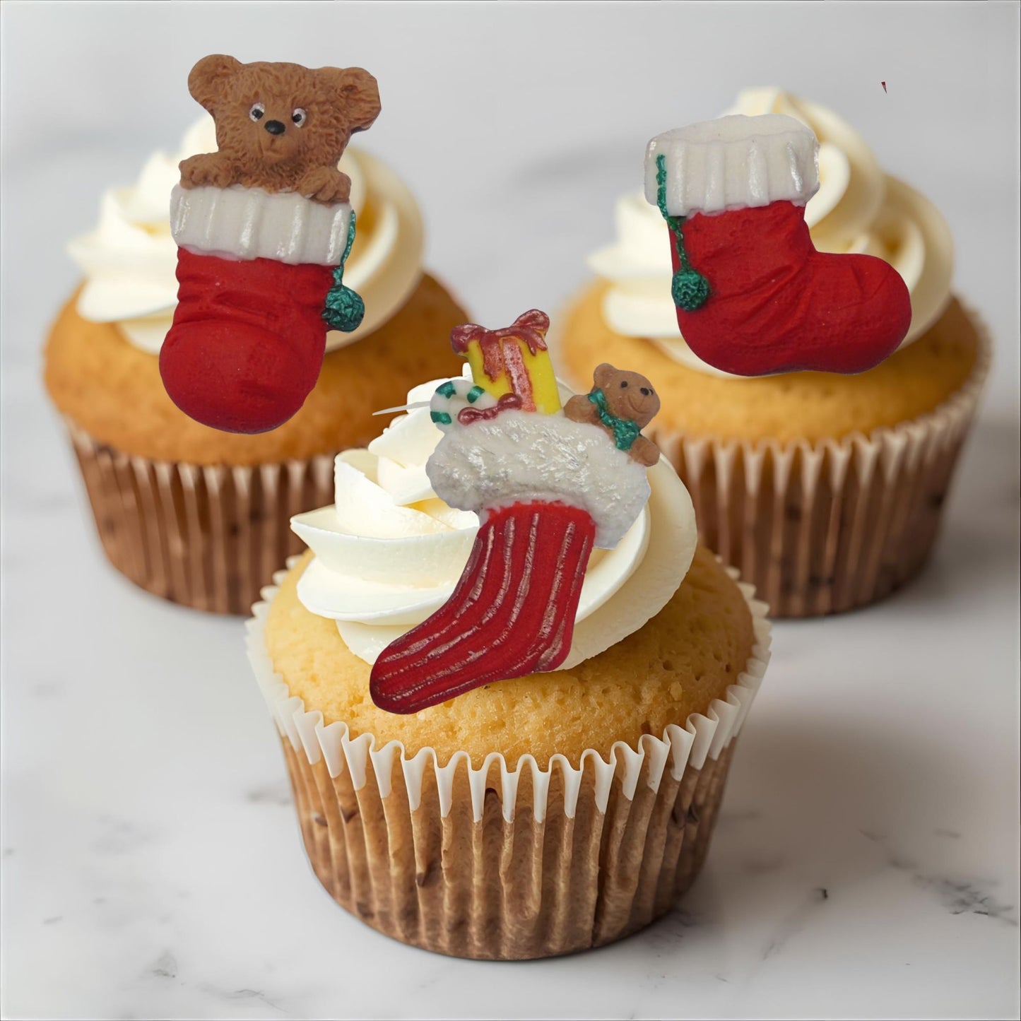 Cupcakes decorated with Christmas-themed edible toppers