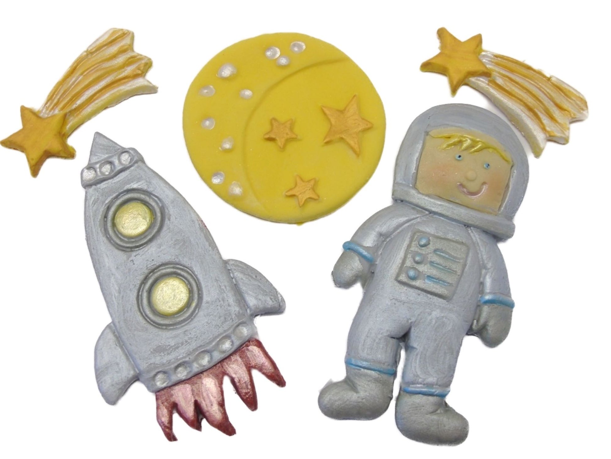 A Large Spaceman Rockets Set Vegan Cake Toppers