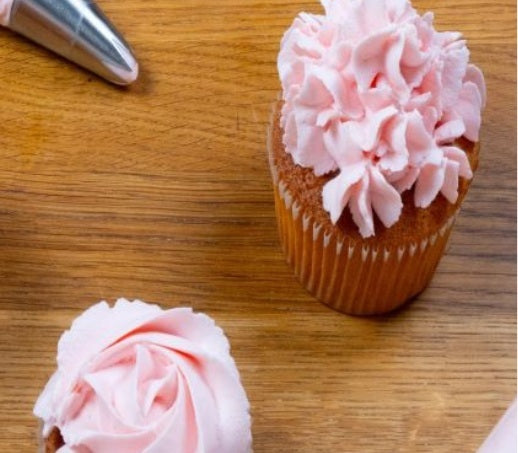 Tow butter creamed cupcake waiting for their decorations