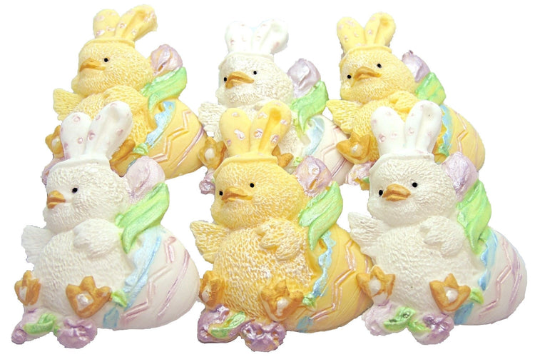 A collection of chicks as cake toppers from the easter collection.