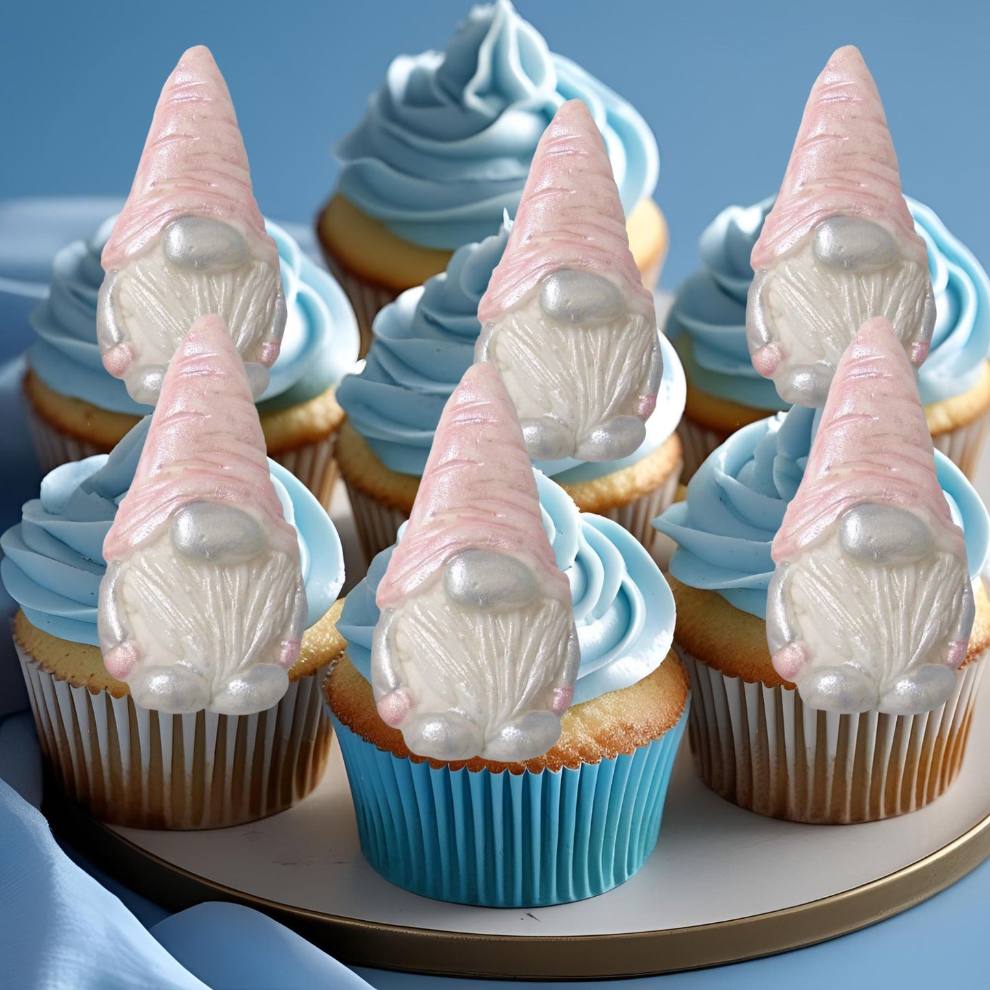 Cupcakes with pink gnome decorations on a blue background