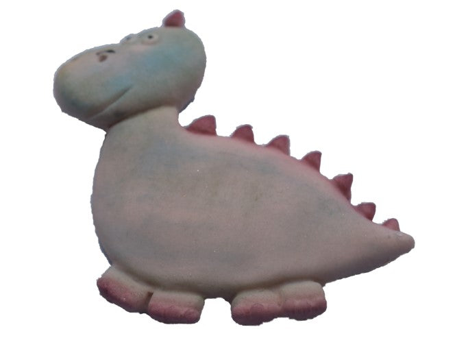 Large dinosaur cake topper on a white background