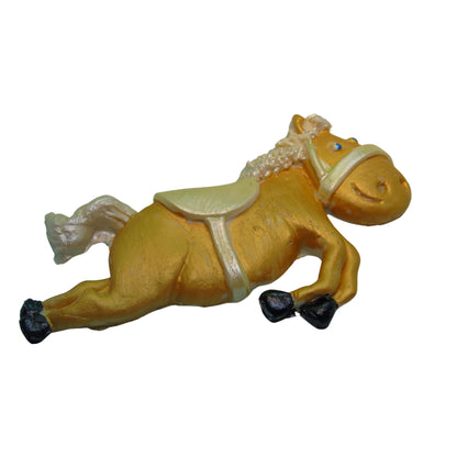 Gold Coloured horse  cake topper decoration with a saddle on a white background